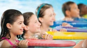 child swim lessons with flutter boards