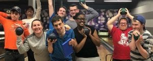 WAVE group having fun- adults with autism program out bowling