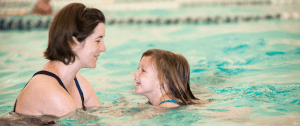 private swim lessons- child learning to swim