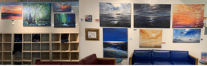 Landscape acrylic painting hanging on the wall